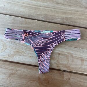 Maaji reversible bikini bottoms in “chi chi” cut size medium